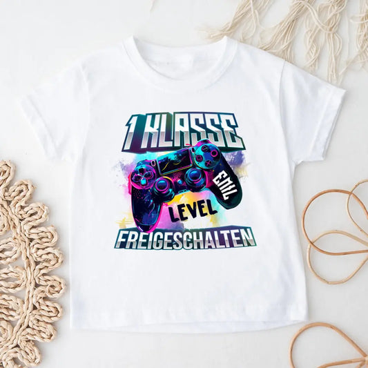 Personalisiertes Kinder T-Shirt - 1 Klasse Level freigeschalten mit Name - Geschenk zur Einschulung